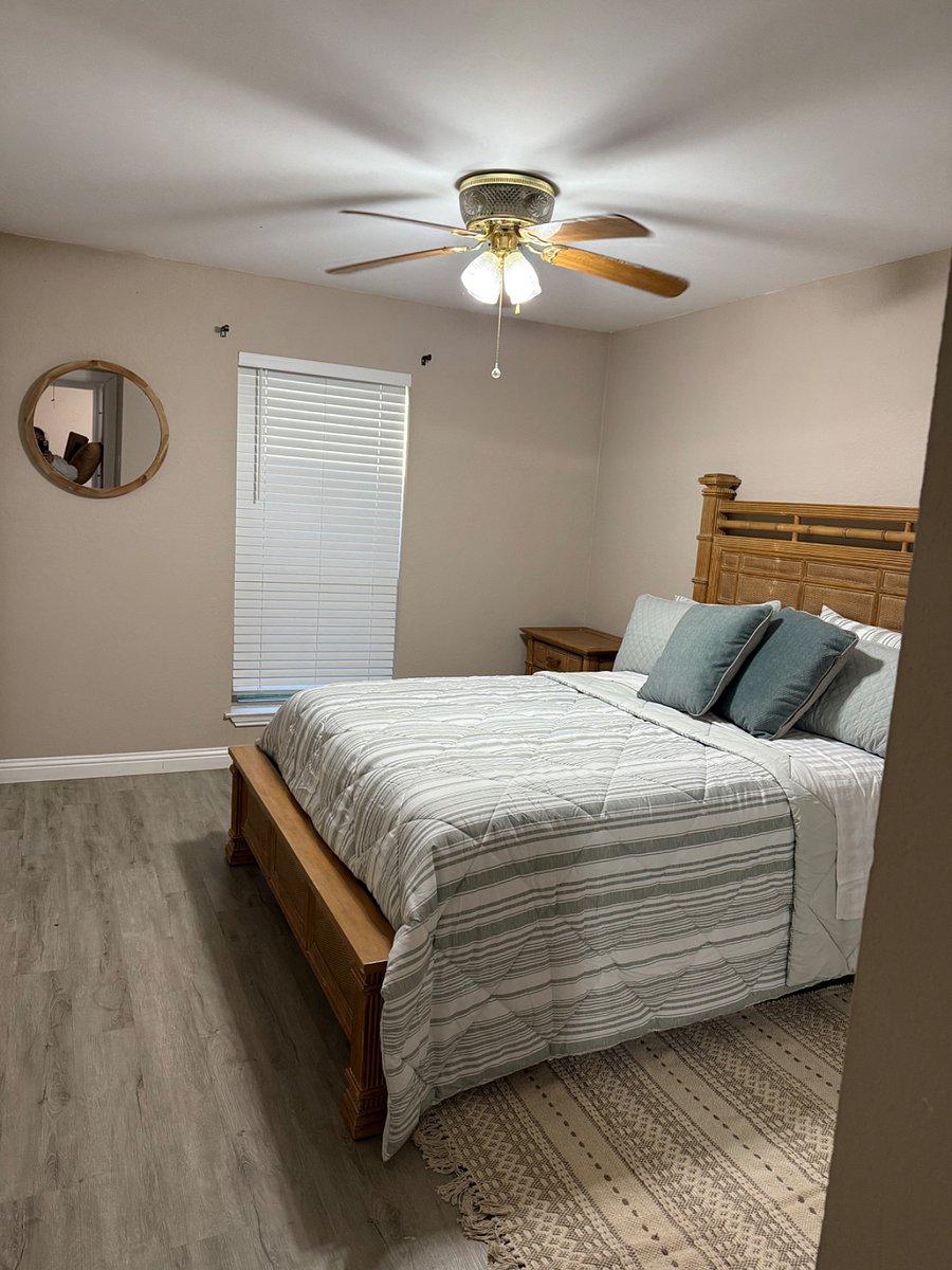 master bedroom, night stand, rug, chair