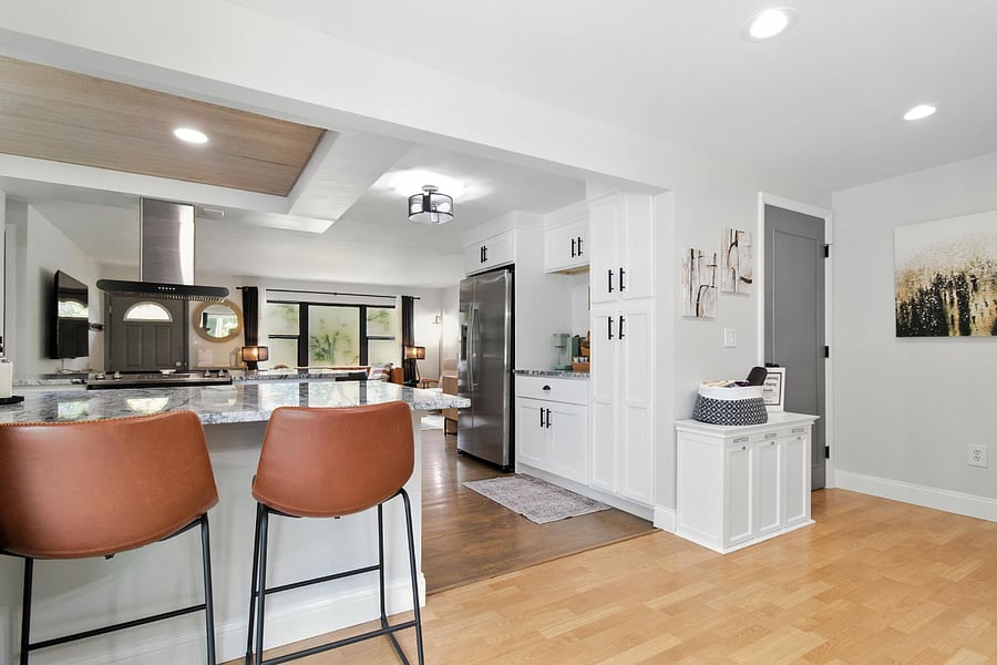 Kitchen has countertop seating for two.