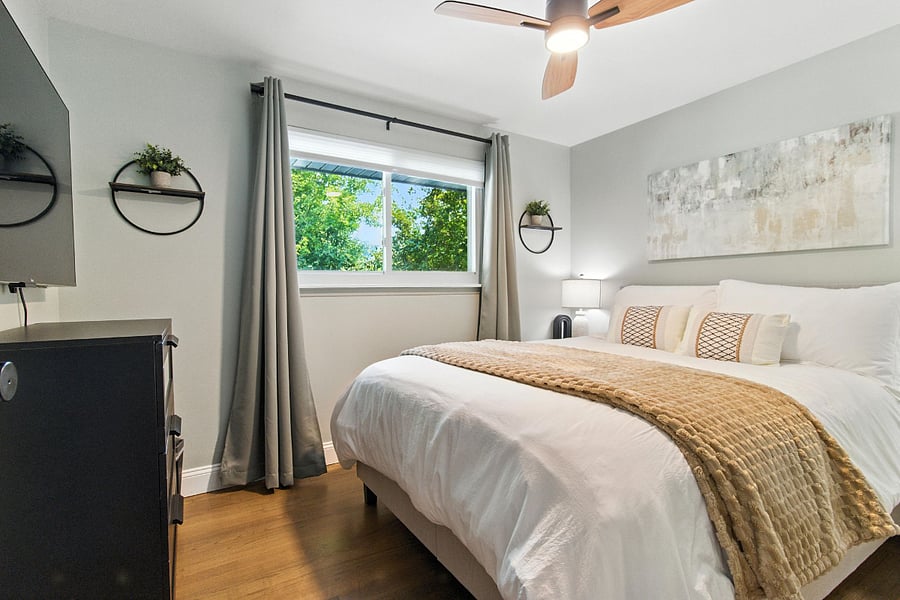Bedroom 2 has a queen Dreamcloud medium-firm hybrid mattress with 100% cotton linen, pull down blinds, and black-out curtains.