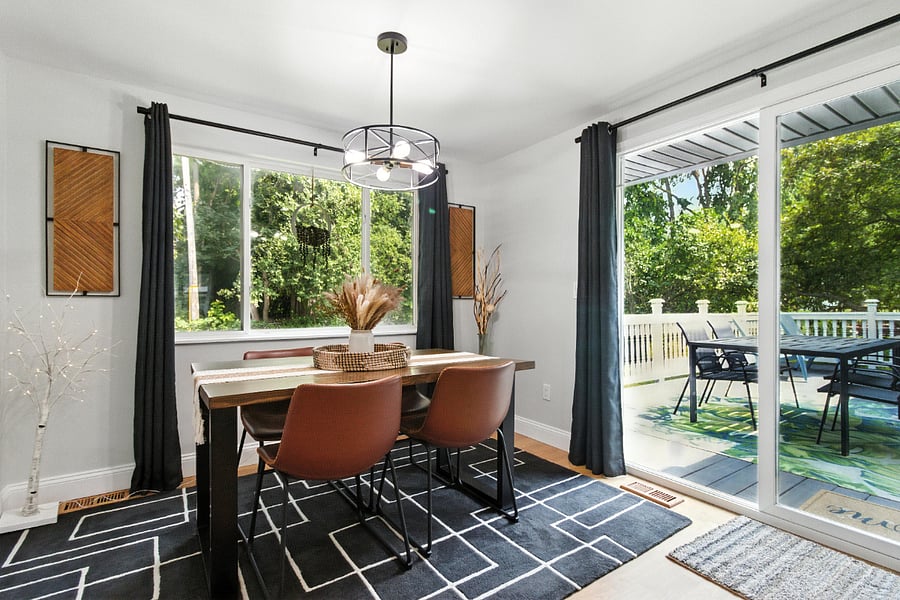 Dining room table accommodates four people.