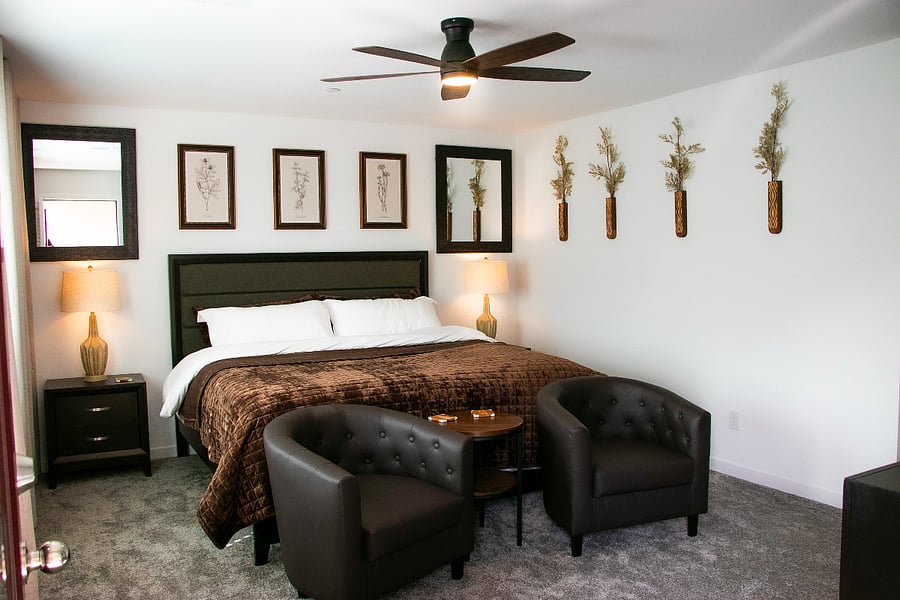 2nd Floor: Master Bedroom w/ King Size Bed, Walk-in Closet, En Suit Bathroom, and Private Balcony