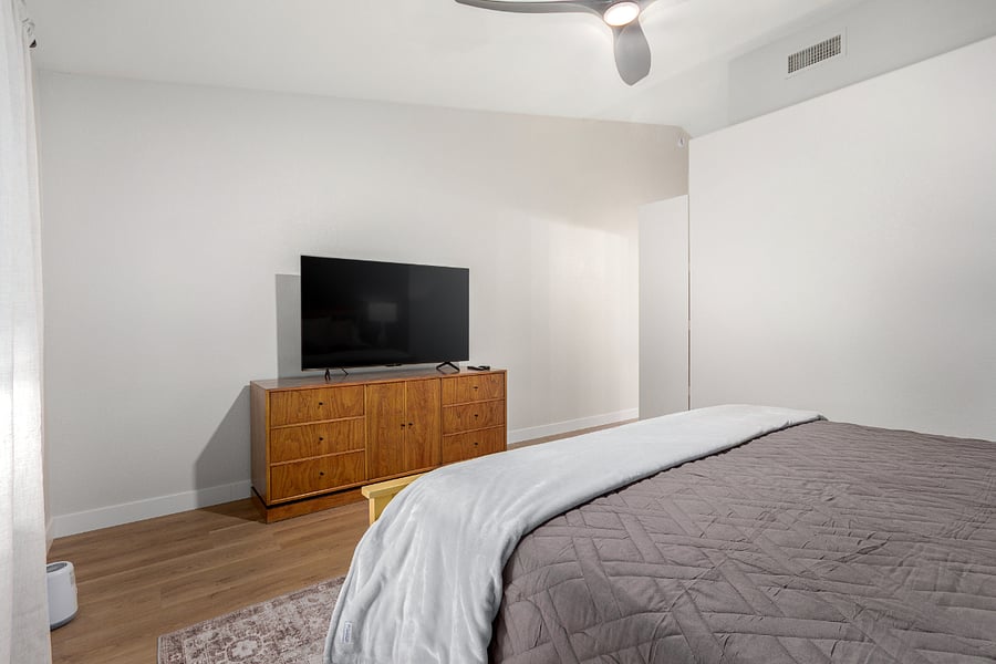 Smart TV In Primary Bedroom