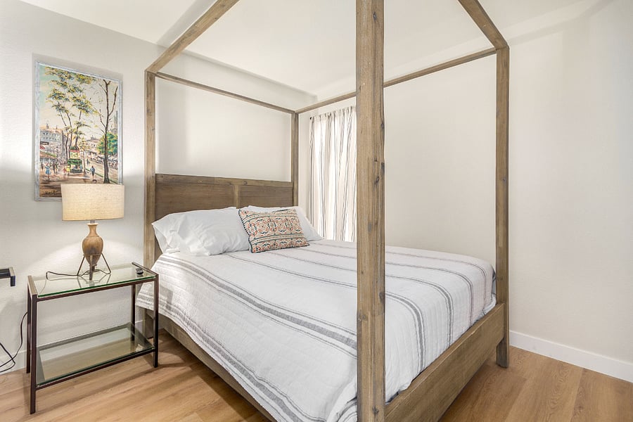 Bedroom 2 (Smart TV on Wall Opposite Bed)