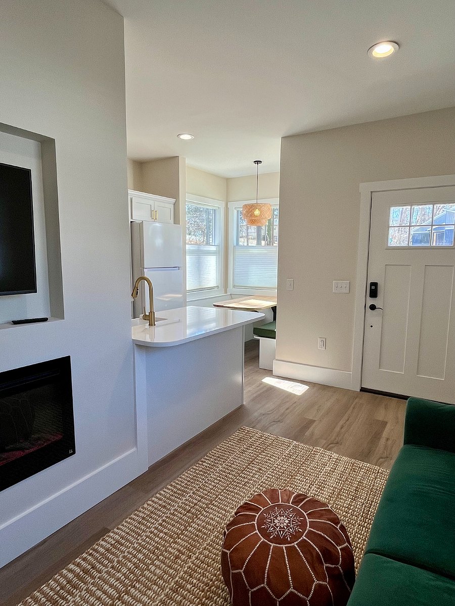 Green House swivel mount TV (you can watch from the bedroom!) and electric fireplace