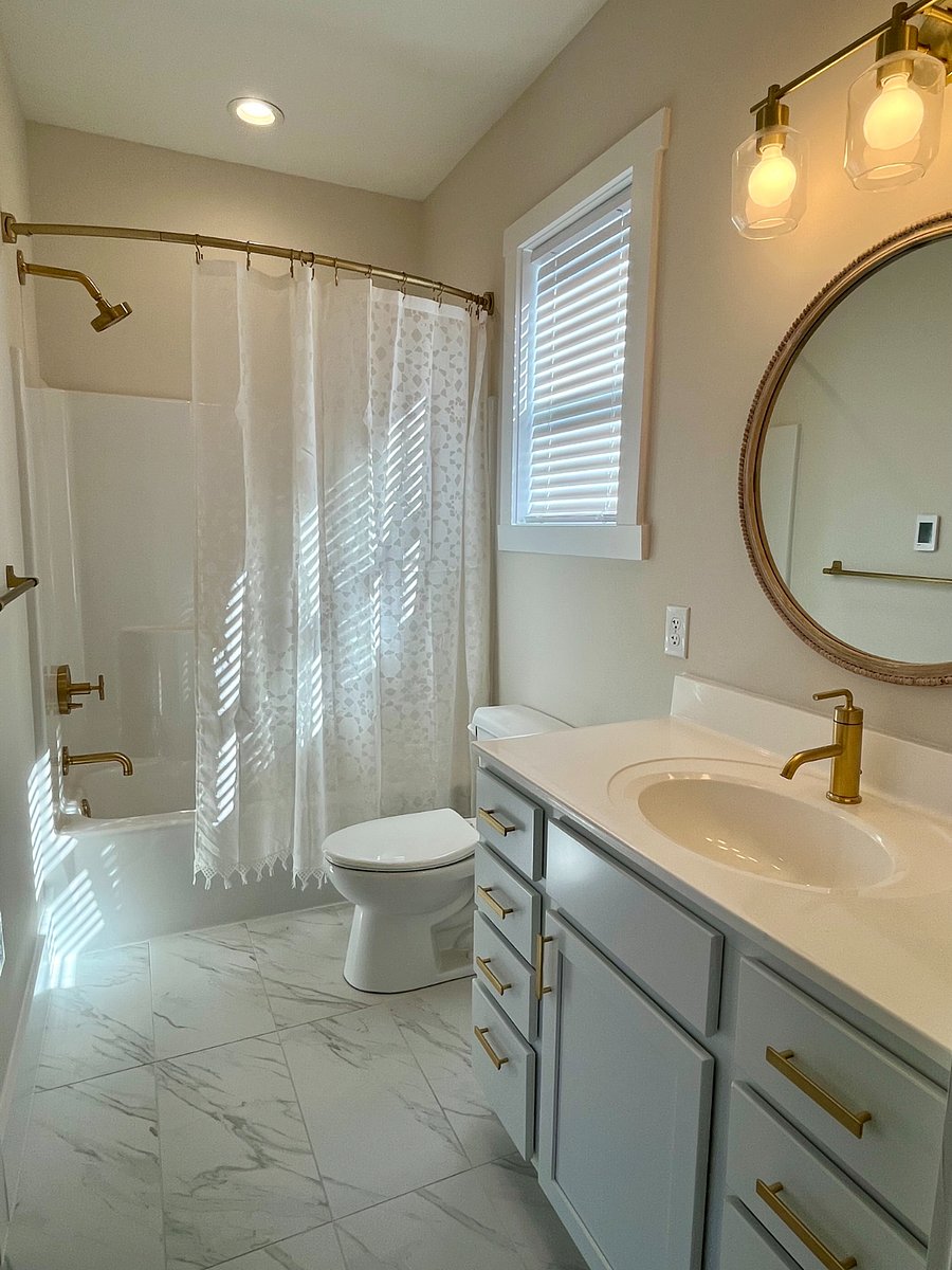 Greenhouse heated bathroom floors, tub and shower combo