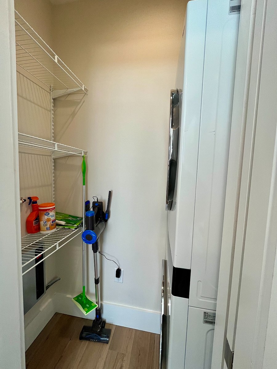 Yellow House Stacked Washer/Dryer in pantry