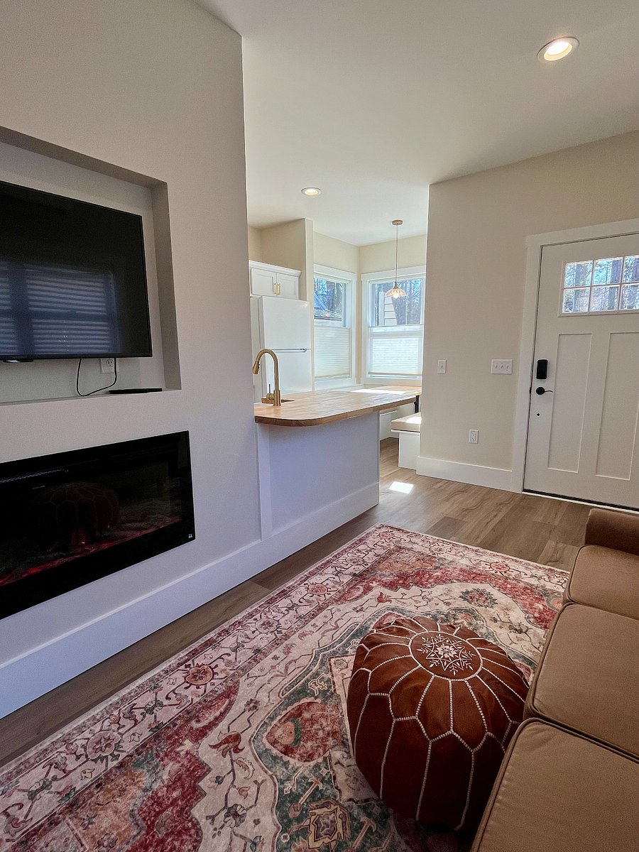 swivel mount TV (you can watch from the bedroom!) and electric fireplace
