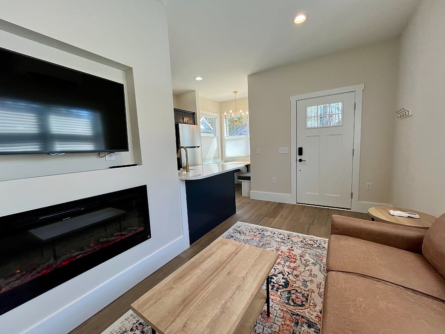 swivel mount TV (you can watch from the bedroom!) and electric fireplace