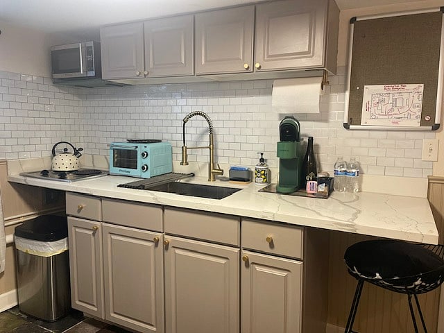 The kitchen comes fully equipped with a deep sink and spray faucet, stovetop, toaster oven, fully-size refrigerator and Keurig machine, along with all the dishes, pots, pans and utensils you need to prepare and enjoy your daily meals.
