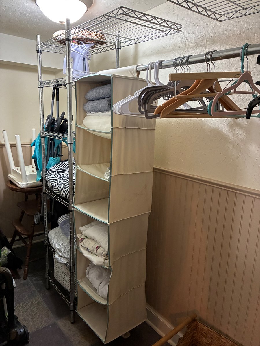 Spacious walk-in closet equipped with ample hanging space, built-in shelving, and all the essentials youll need for a comfortable stay.