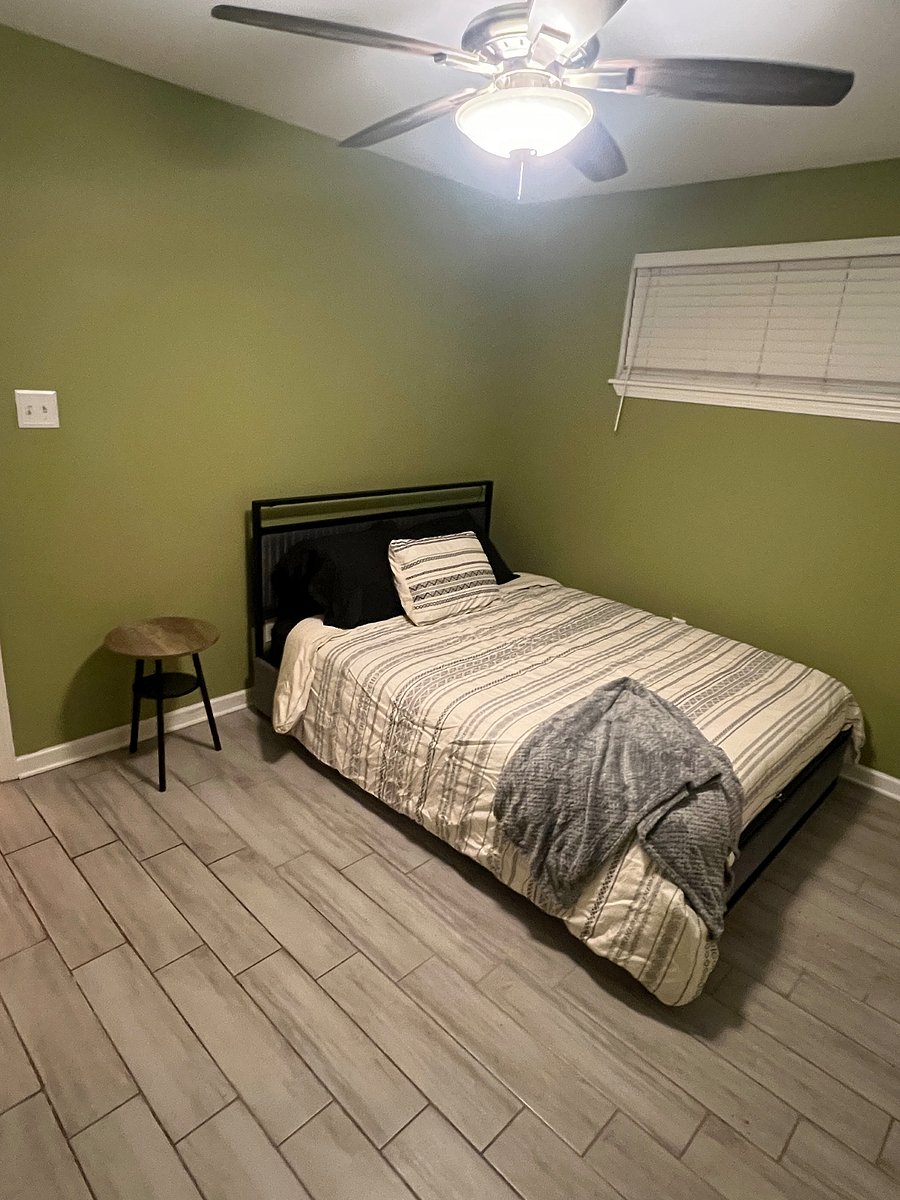 Bedroom 2, queen size bed with linen, USB charging port and LED lights in headboard