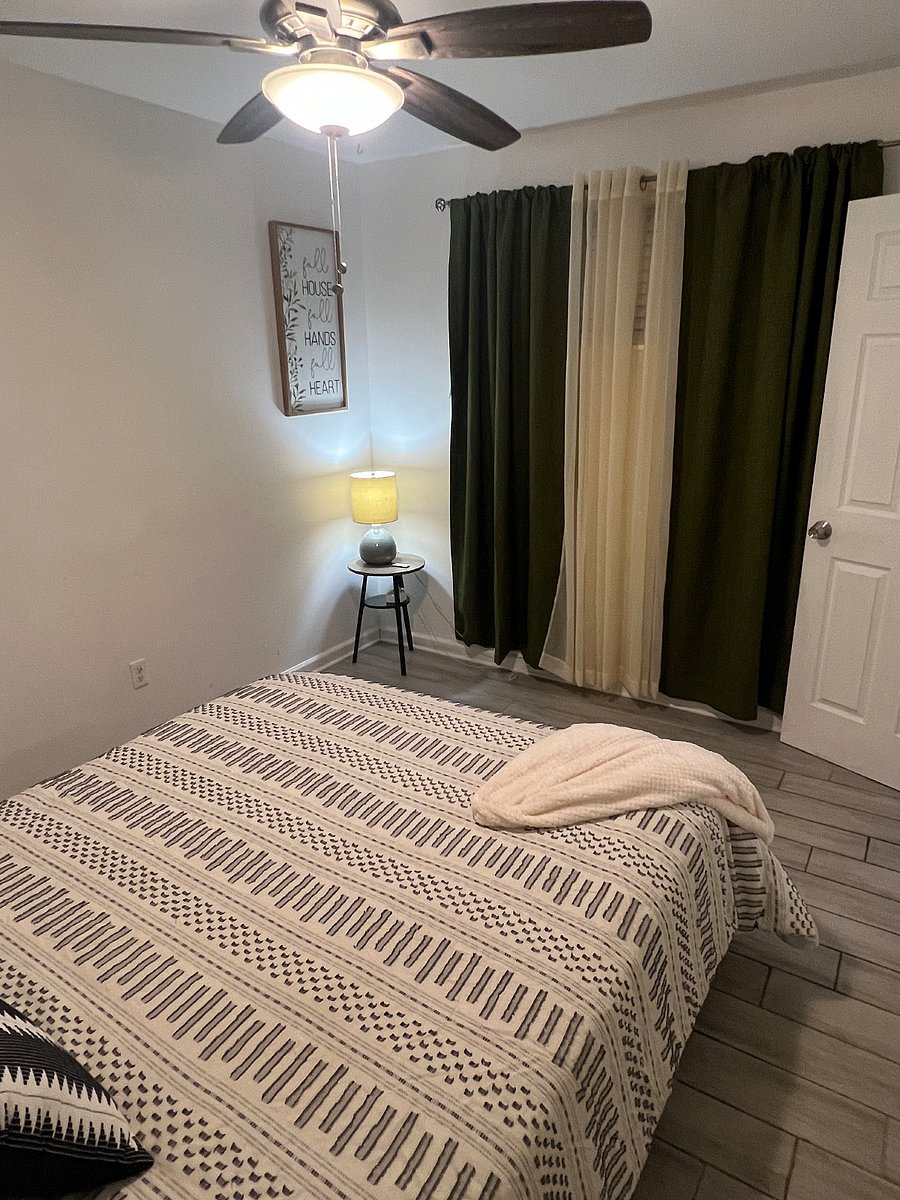 Bedroom 3, queen size bed with linen, USB charging port and LED lights in headboard