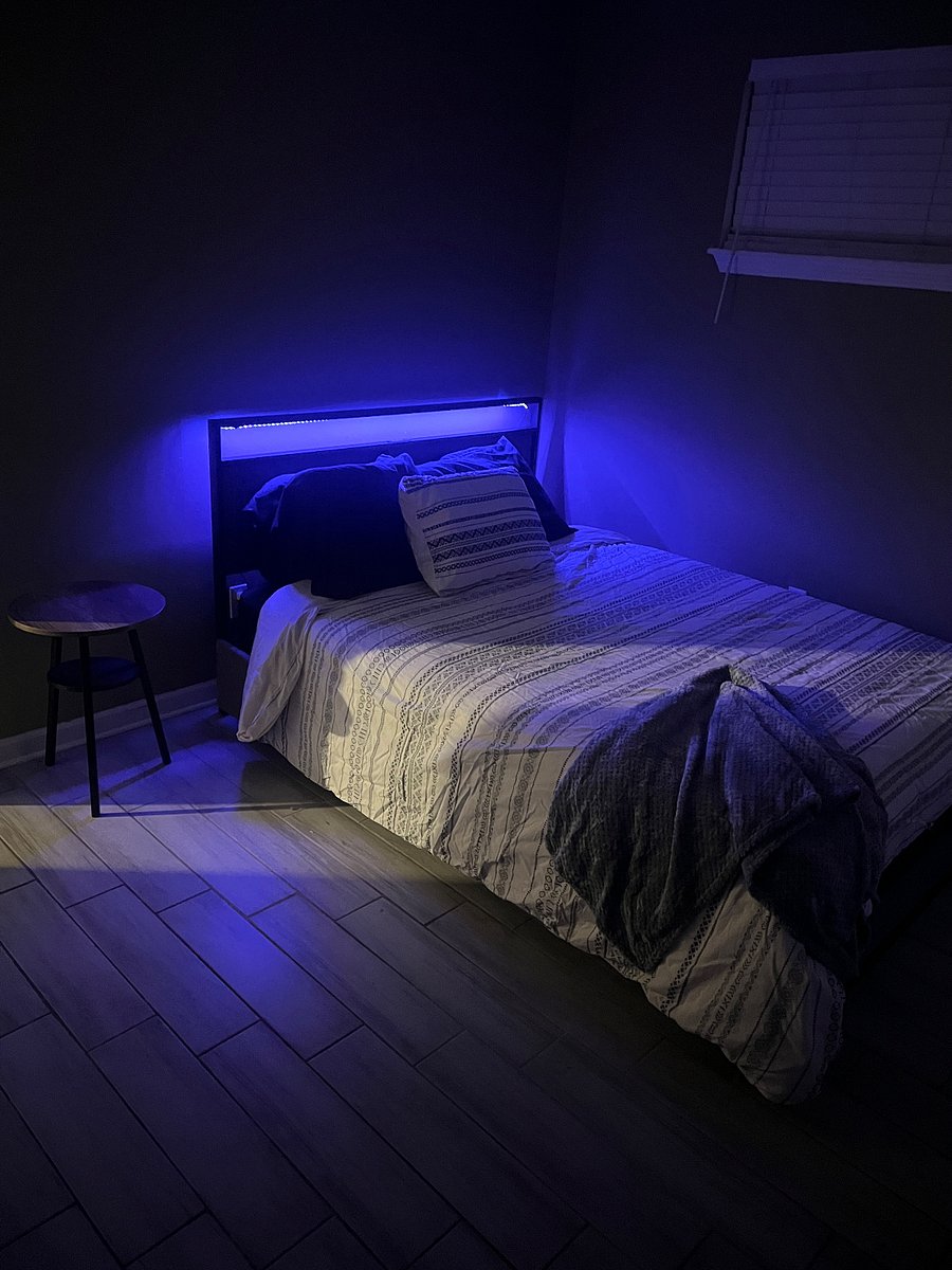 Bedroom 2, queen size bed with linen, USB charging port and LED lights in headboard