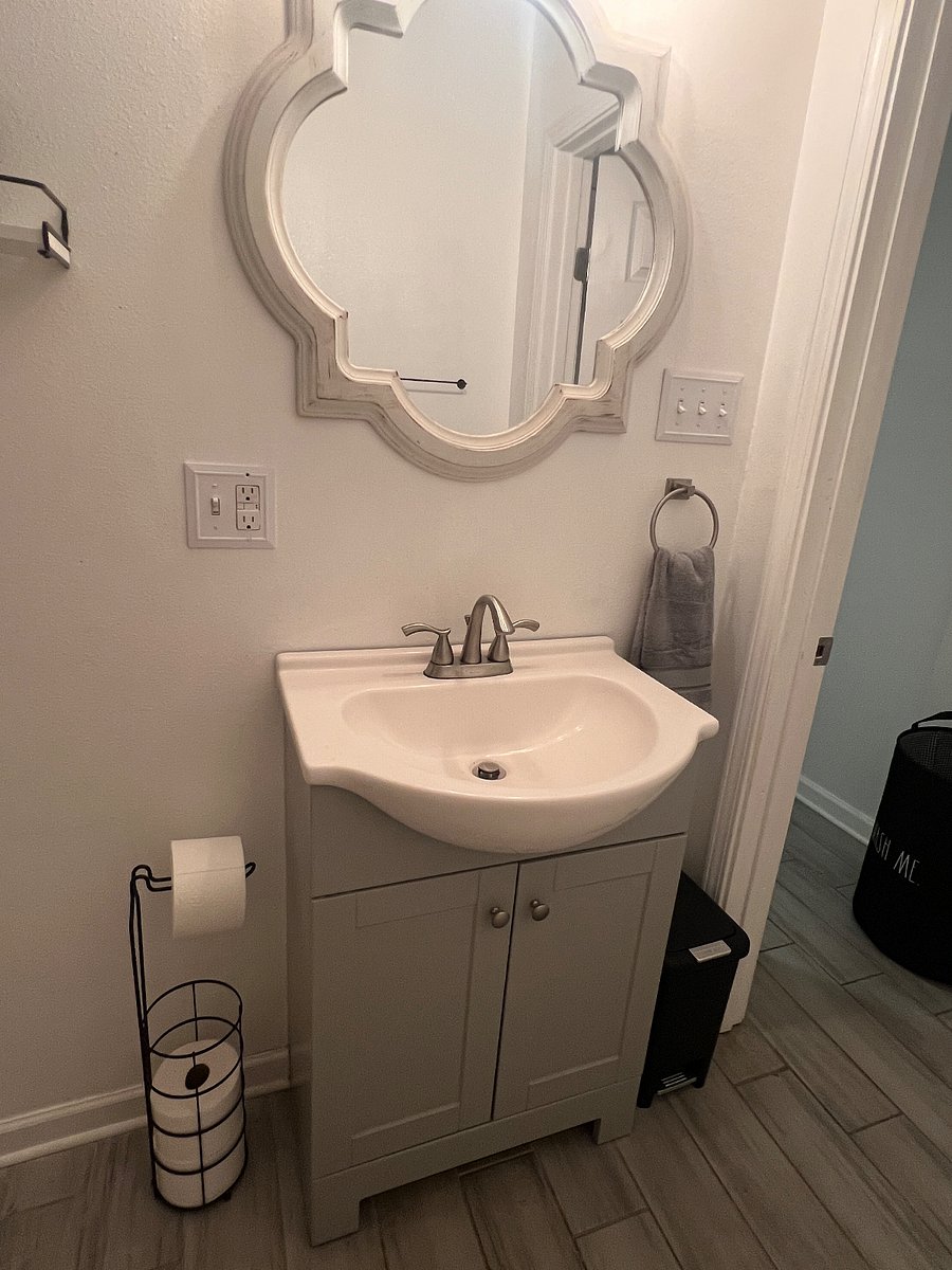 Private bathroom located in back bedroom
