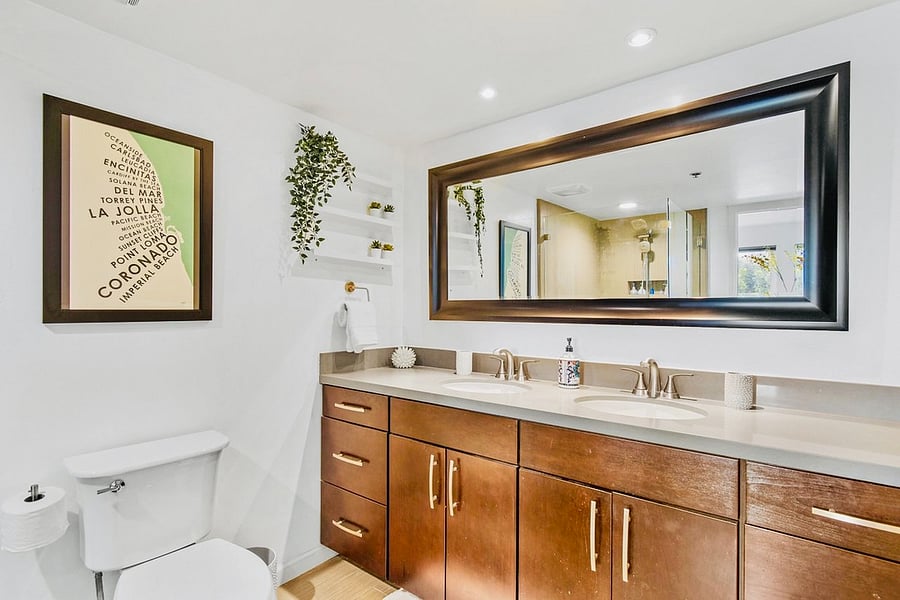 Upgraded Bathroom with Dual Sinks and Ample Storage