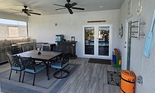 lanai with outdoor sink, BBQ grill, mini fridge, heated towel rack, oversized connect 4 game