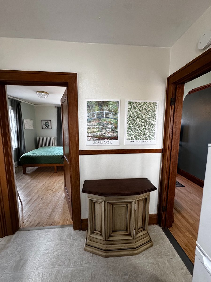 view of bedroom and living room entrance