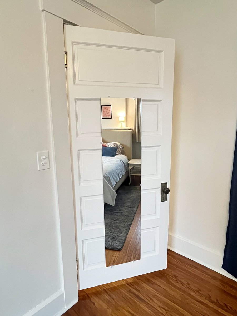 full length mirror in main bedroom