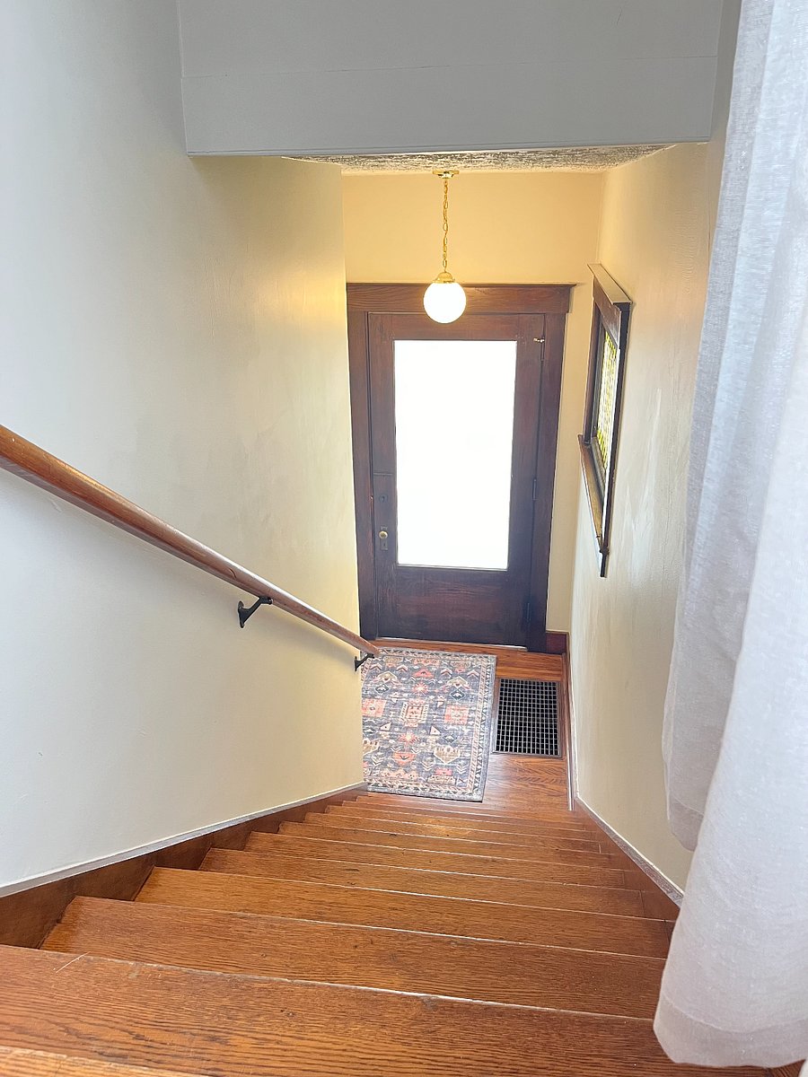 view down steps to private front entrance