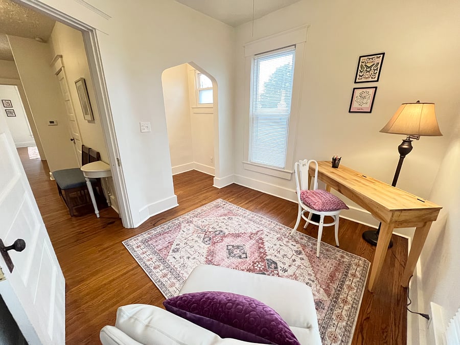 private full office with desk and soft chair
