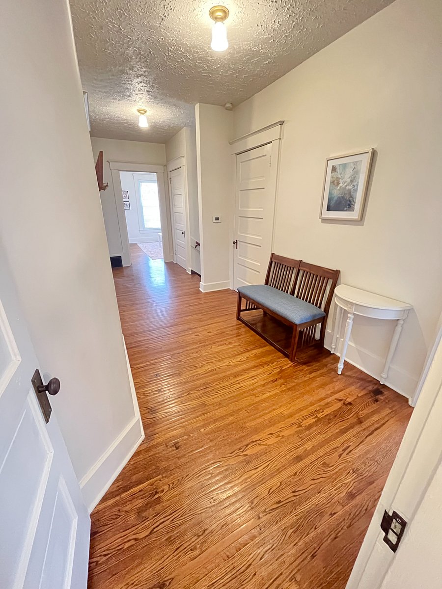 comfortable landing spot when you enter apartment up the steps
