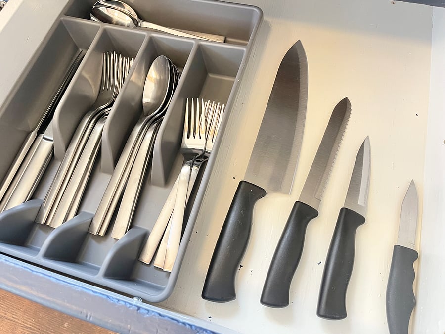 brand new knives and plenty of silverware