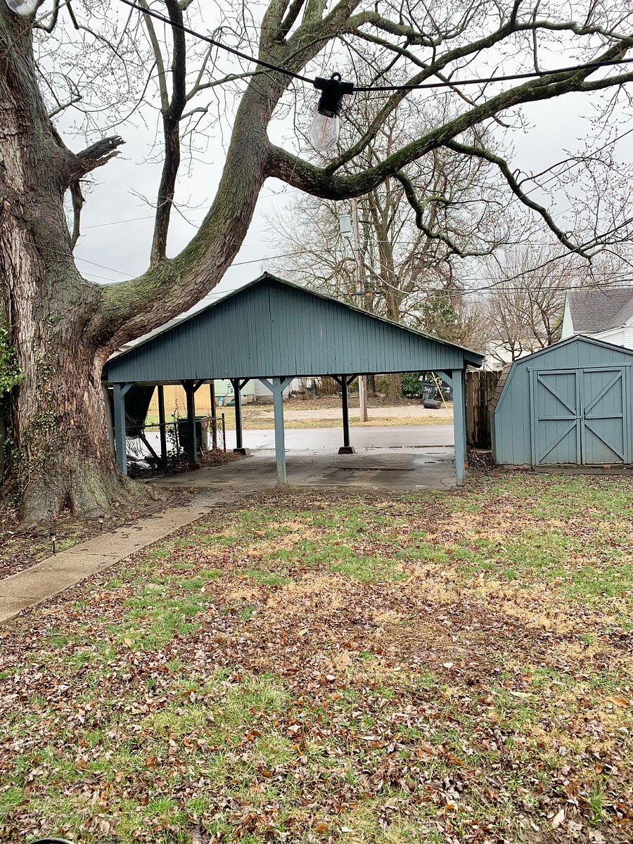 private covered parking as viewed from the backyard