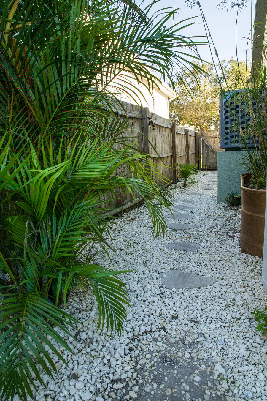 Side walking entry from garage to backyard.