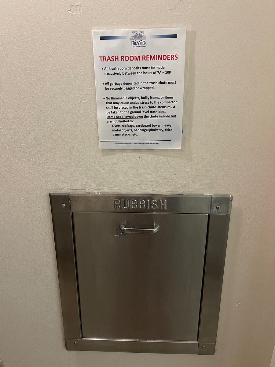 Garbage shoot located on 20th floor -opposite corner left door near exit