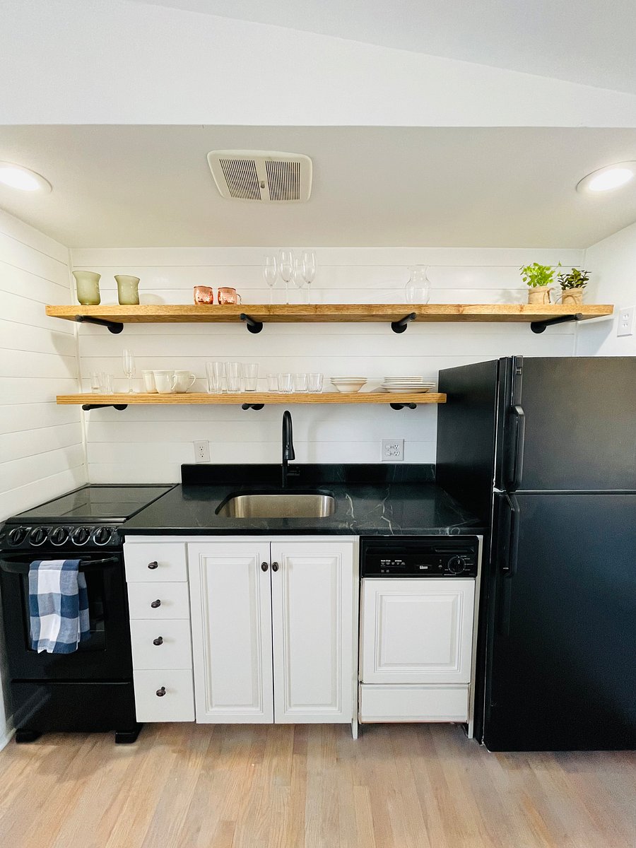 Stove/oven, dishwasher, full-size refrigerator (microwave in cabinet)