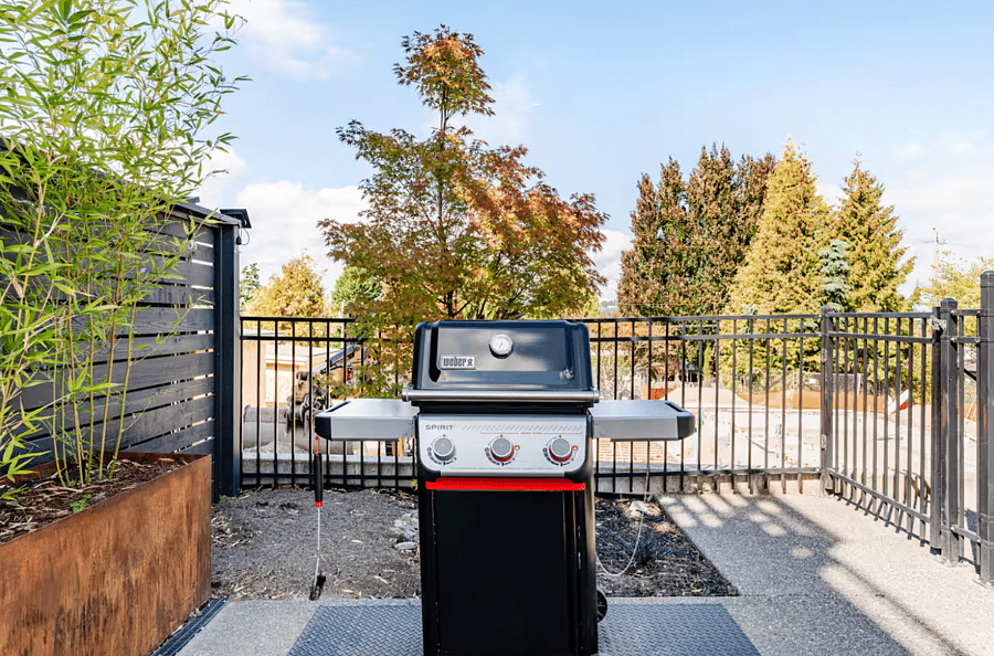 Weber grill on the back patio to enjoy while taking in peekaboo views of Lake Washington.