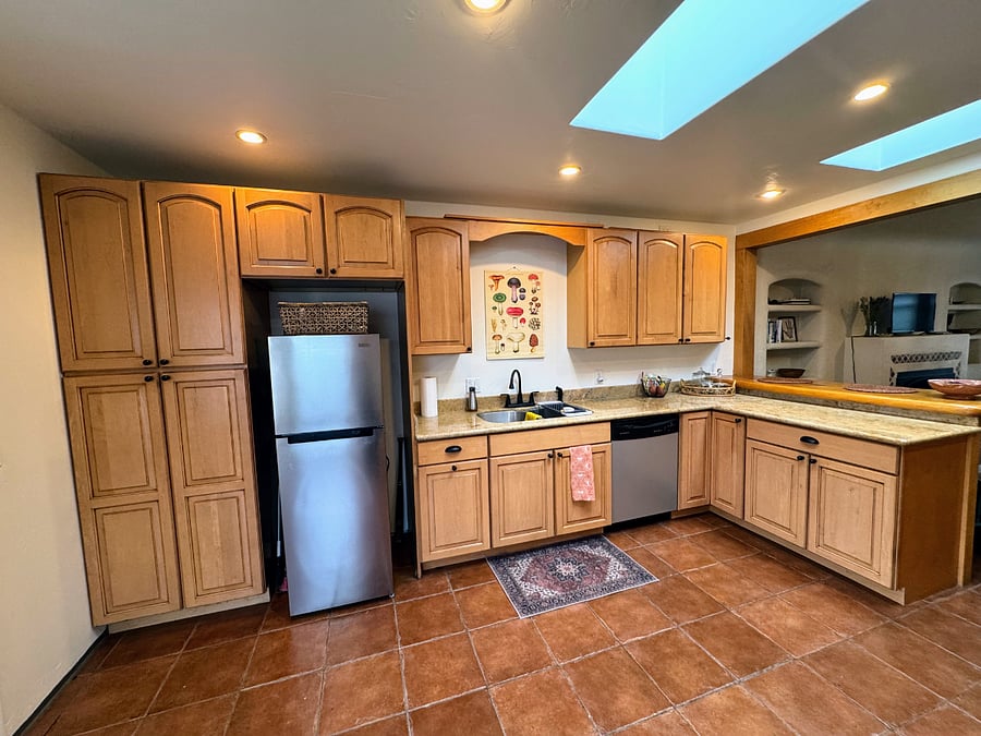 Dishwasher and brand new fridge. Stocked with cleaning supplies.