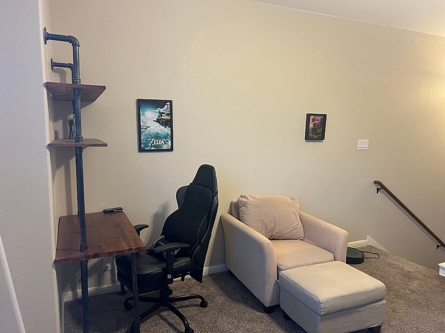 Your private, chill-out loft area with workspace and couches.
