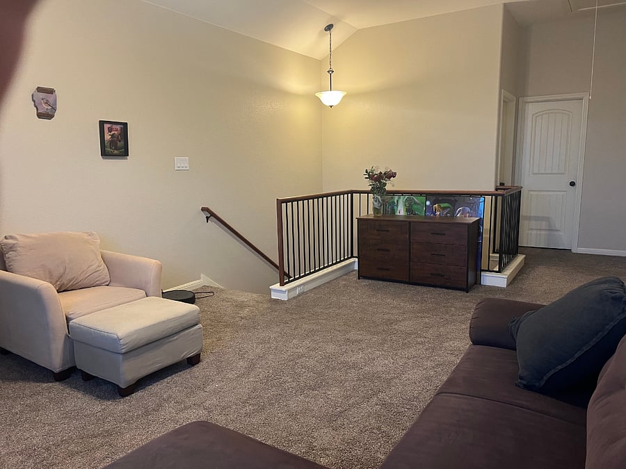 Your private, chill-out loft area with workspace and couches.