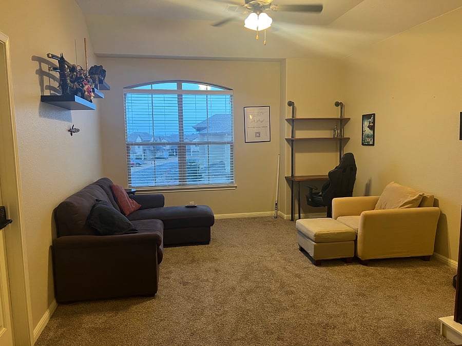 Your private, chill-out loft area with workspace and couches.