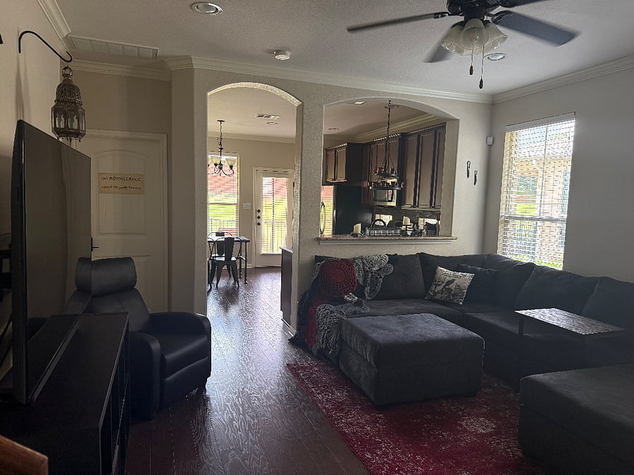 Shared downstairs living space with smart TV, gaming consoles, books and games
