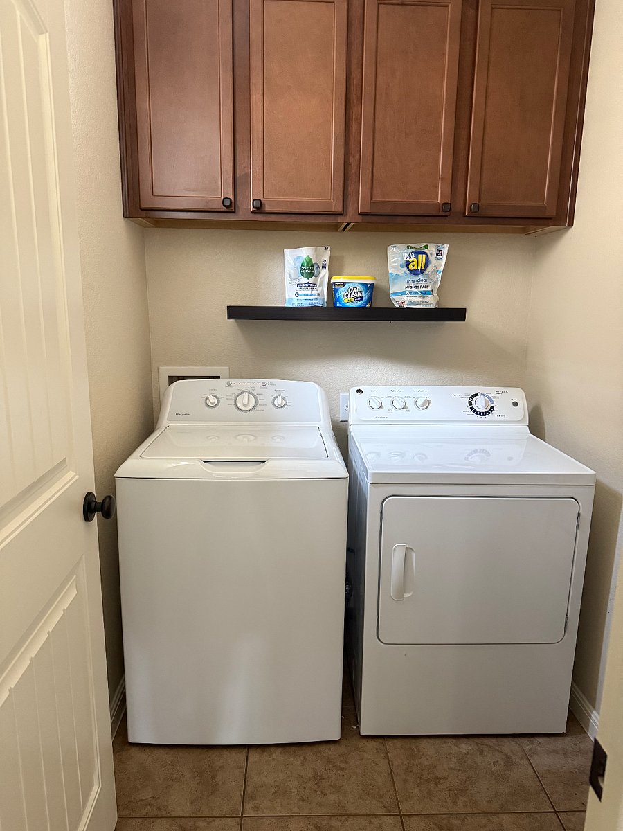 Shared in-home laundry room with washer and dryer