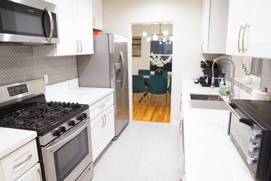 Modern gala kitchen, fully equipped with appliances and cookware
