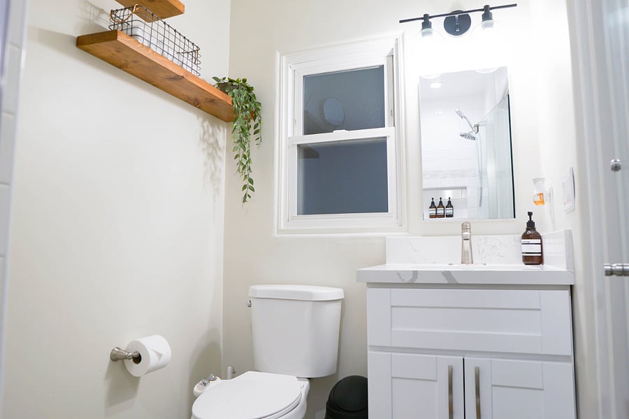 Primary bathroom with a standing shower, equipped with towels, shampoo/ conditioner, body wash. Bidet is installed in the primary bathroom as well