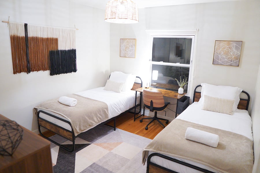 Third bedroom features 2 Twin XL beds, a desk, drawer and closet. Perfect for the kiddos or singles