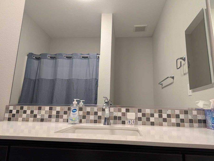 LARGE MIRROR IN MAIN BATHROOM