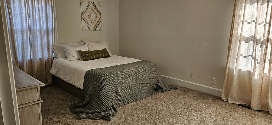 Bedroom 1 with attached full bath.