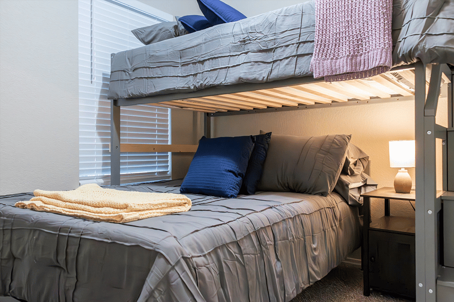 Middle Bedroom Has a Queen Size Bed with a Single Top Bunk; Both Beds Have 2000 Thread Count Luxury Bamboo Sheets