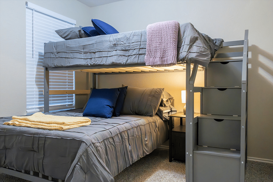 Middle Bedroom Includes Plush Pillows and Soft Blankets for Added Comfort