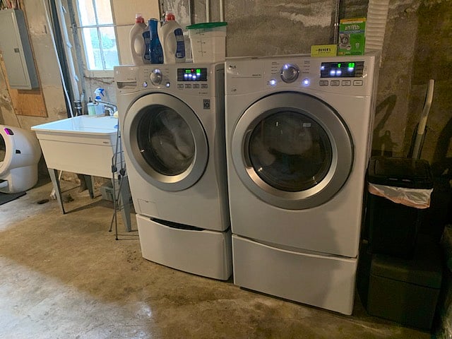 Washer and dryer, little washer under the big washer. 