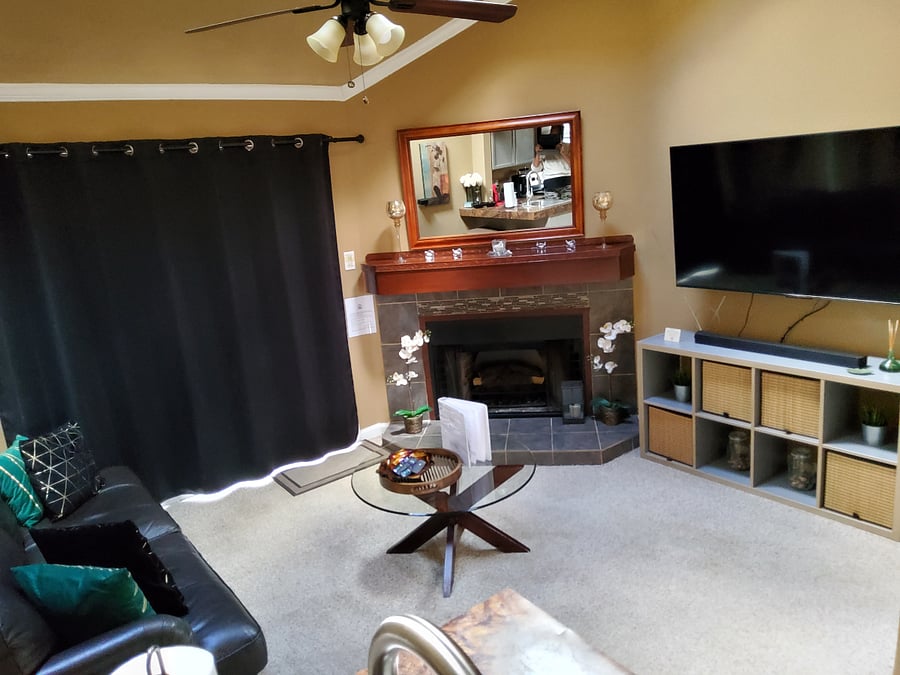 Living room with relaxing fireplace that heats