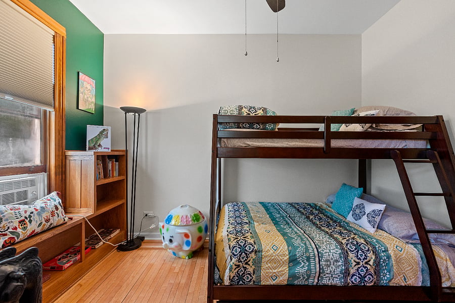 The kids' room is a delightful wonderland filled with books, games, and a collection of giant Legos tucked inside a charming retro elephant toy chest. For younger children, a Pack 'n Play and highchair are available upon request, ensuring everyones comfort and fun.