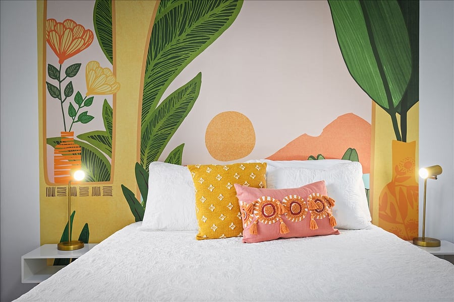 Queen size memory foam mattress in 2nd bedroom featuring mural wall!