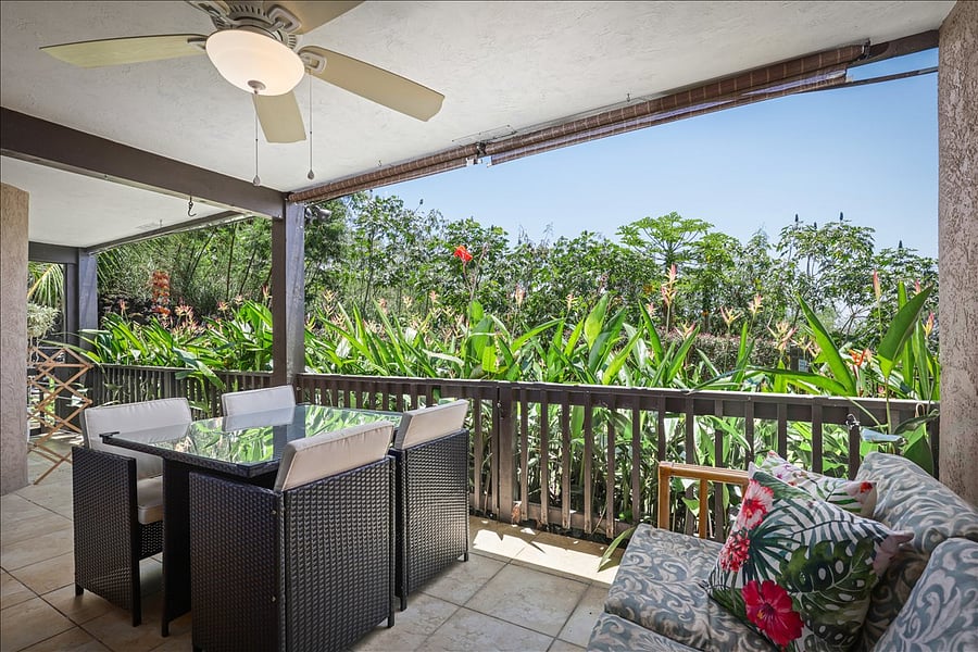 Garden view while sitting on private lanai (patio) through your personal garden. Lay on pull-out sofa, read a book with a cool ocean breeze, listening to tropical birds who live in the jungle adjacent the property.