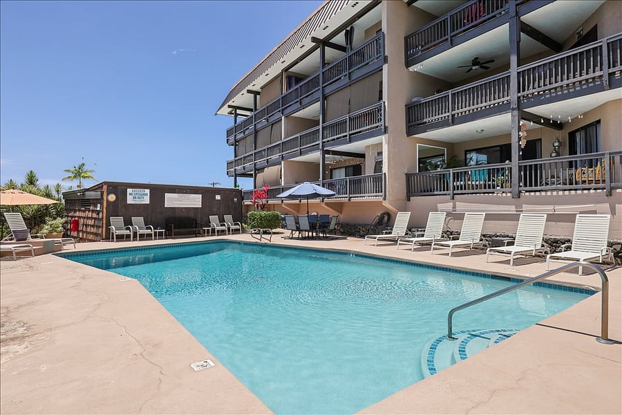 Condo shared salt water 8' deep pool. Pool has ocean view, sunset view, grill & dining area, several seating areas & many new loungers. Some shared pool floaties.Outdoor shower & pool house with bathroom. Small condo building with friendly neighbors.